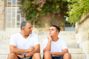 father and son having a conversation