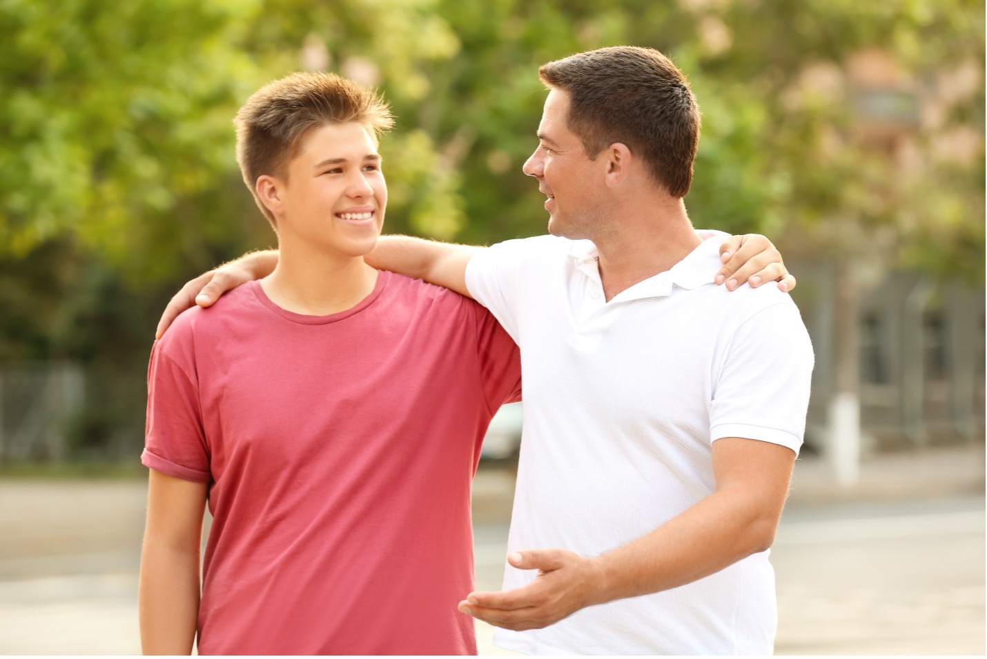 Father and son hugging.