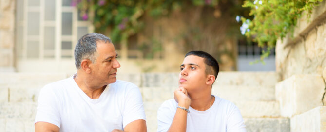 father and son having a conversation