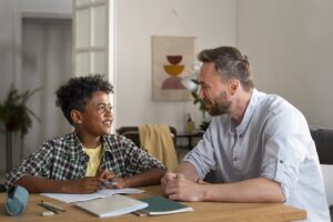 Dad talking to his son